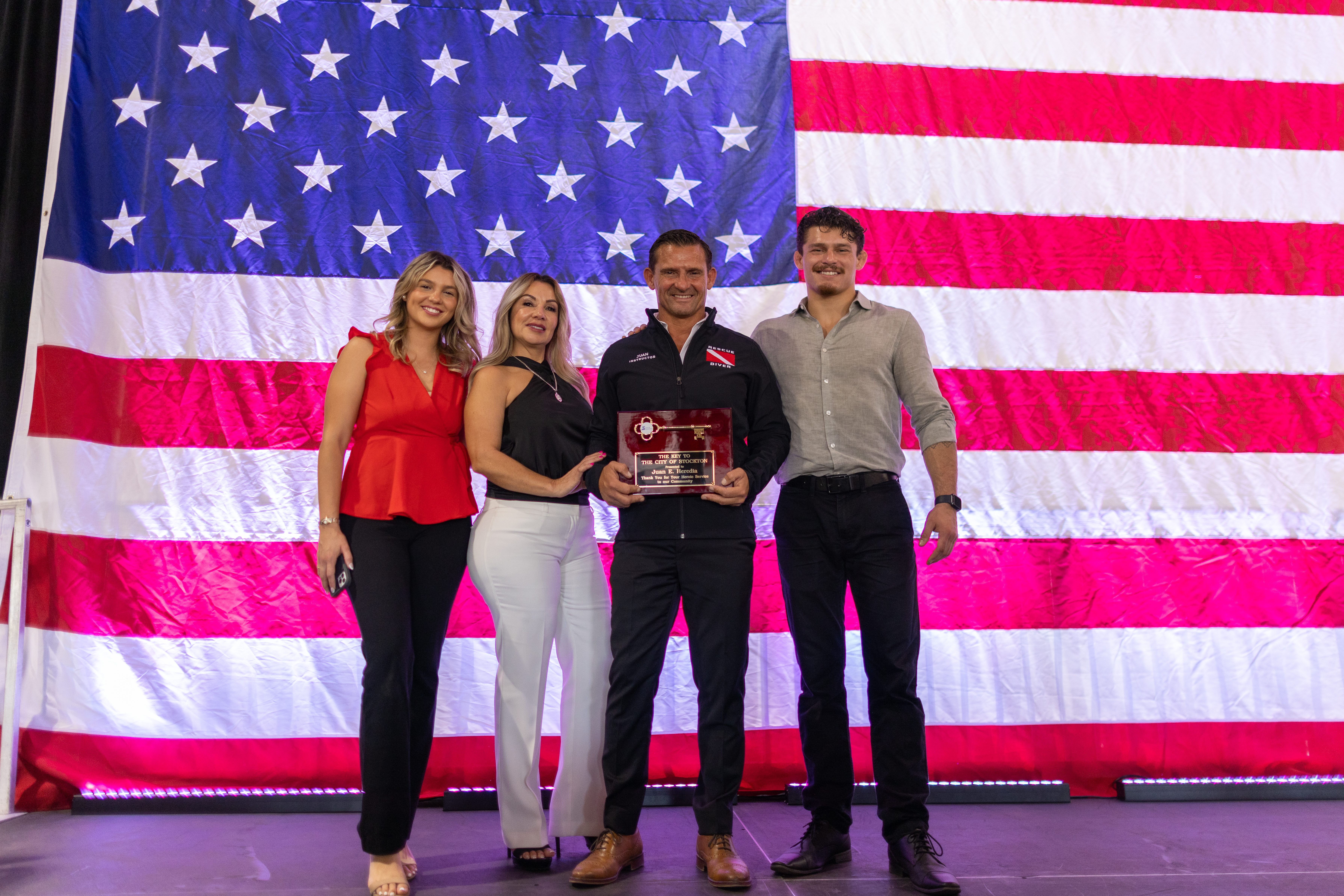 Juan Heredia and his family holding keys to the city