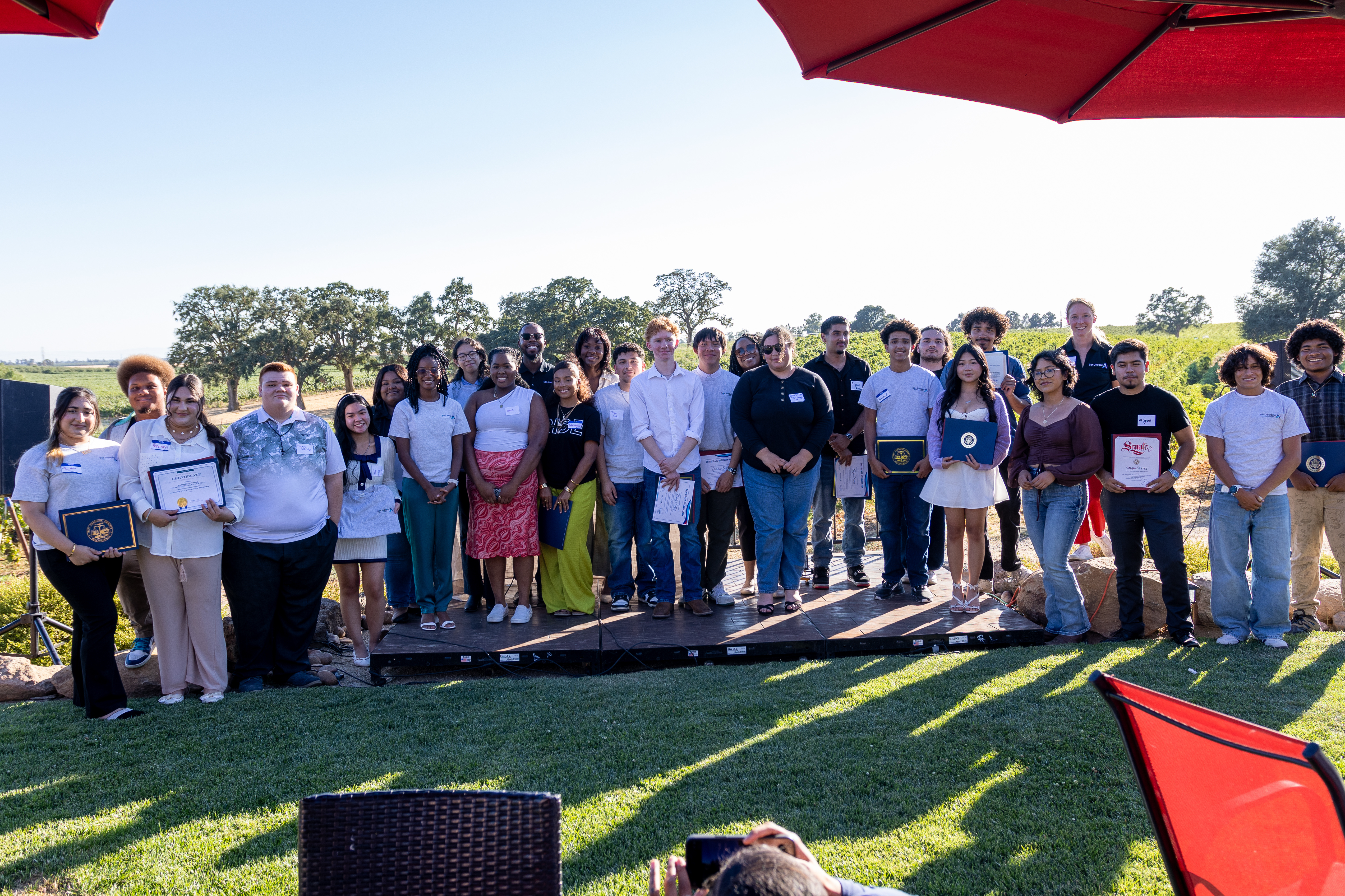 Participants of the Growing Futures Initiative gather for a group photo during their certificate ceremony at Bokisch Vineyards, celebrating the completion of their internships across various industries in San Joaquin County.