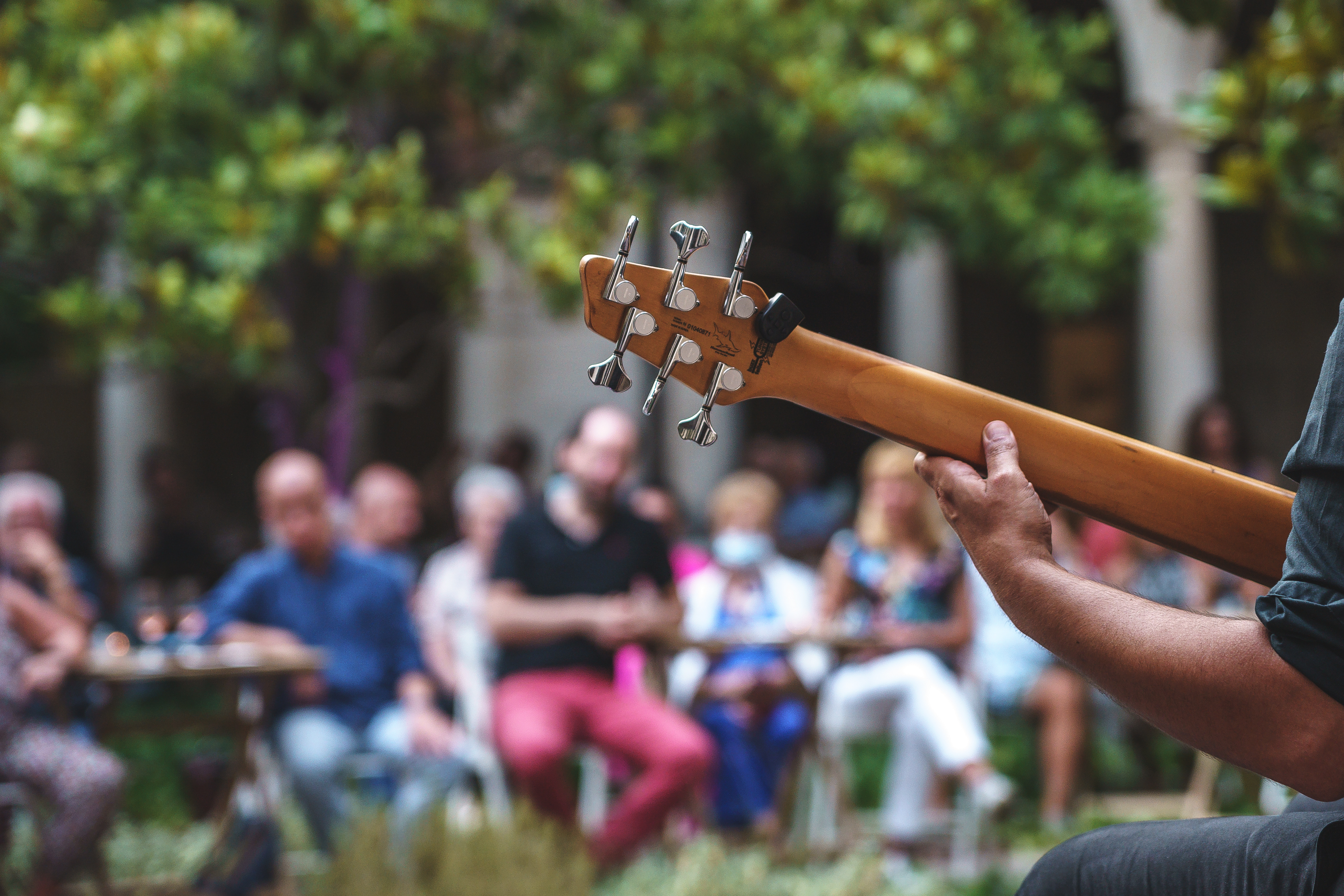 bassist playing for a crowd